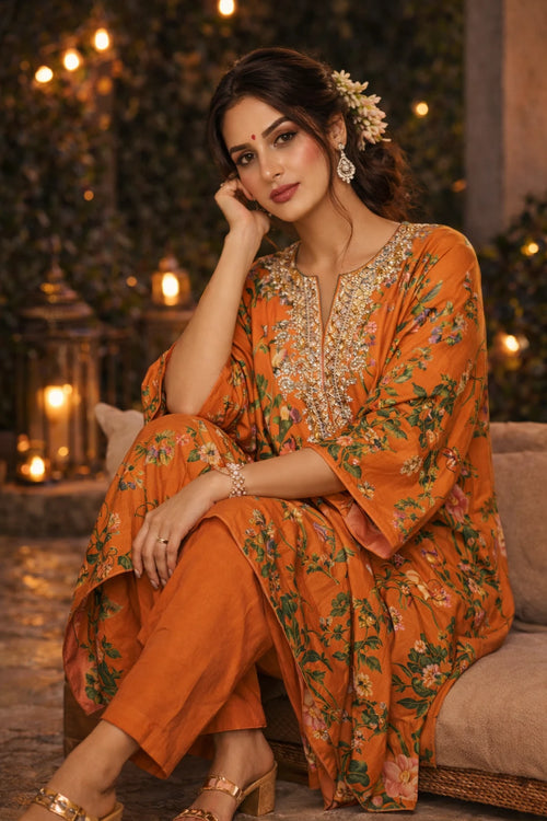 Orange floral printed crepe Nayara Kaftan set with cotton silk pants, styled for a relaxed, elegant look by Kathaa.